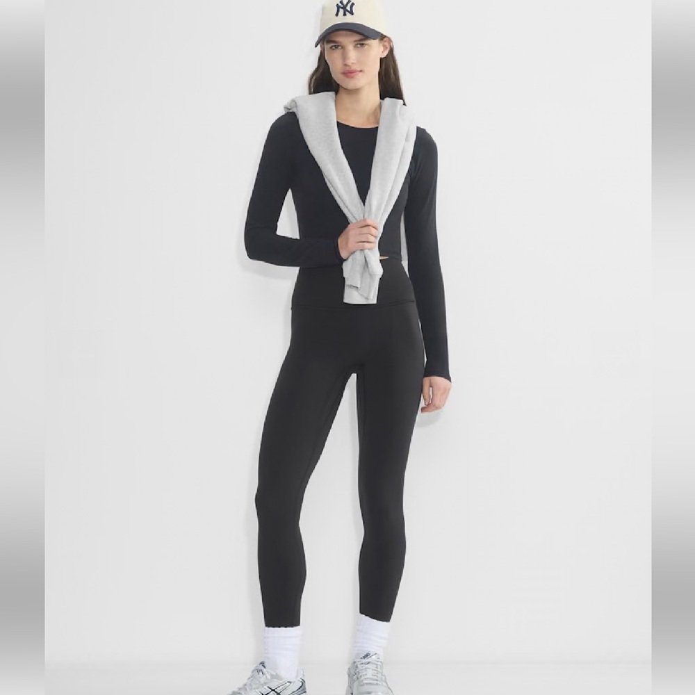 Three pairs, TNA Action Leggings Aritzia